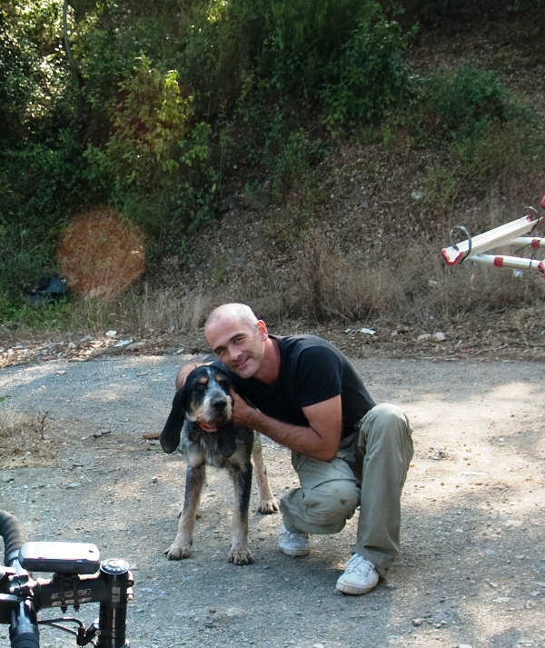 John with floppy eared dog, who was very glad to see a friendly face, especially one who feeds him chorizo