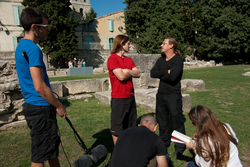 Sam and Alain - John and Fiona crouching in the Roman theatre at Arles