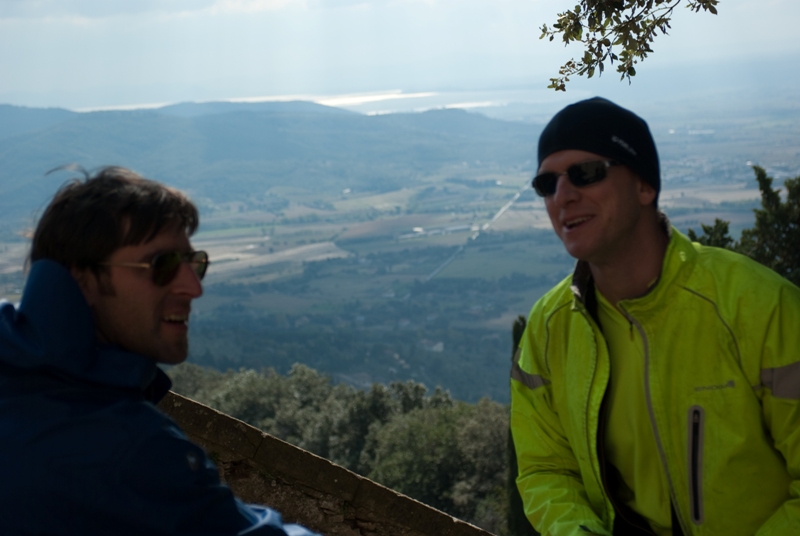 From Cortona - Willo telling his Padre joke next to the Le Celle Monastery! Lake Trasimene in the background...