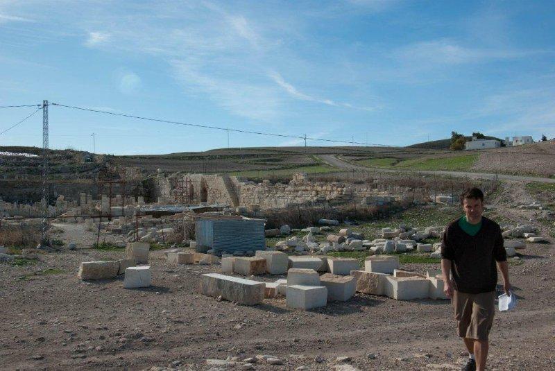 Danny walking in front of the Roman ruins at Zama /Jama. Behind these are rows of vast barrel vaulted Roman water cisterns